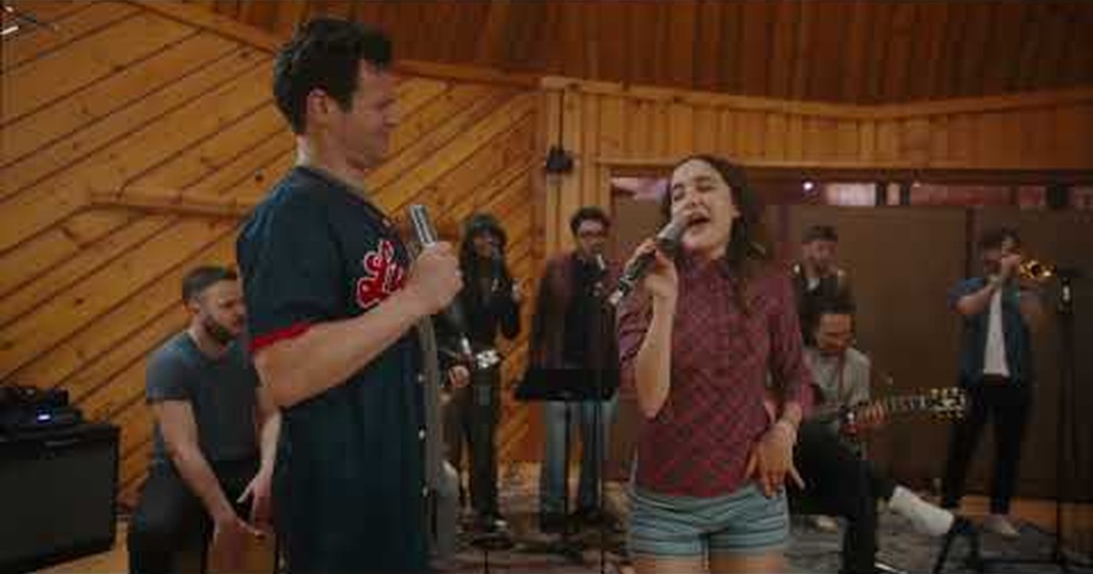 Jonathon Groff singing with other cast members