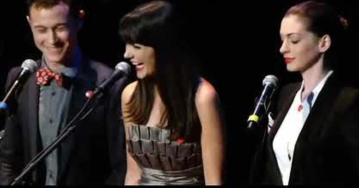 Anne Hathaway sings in French with other performers